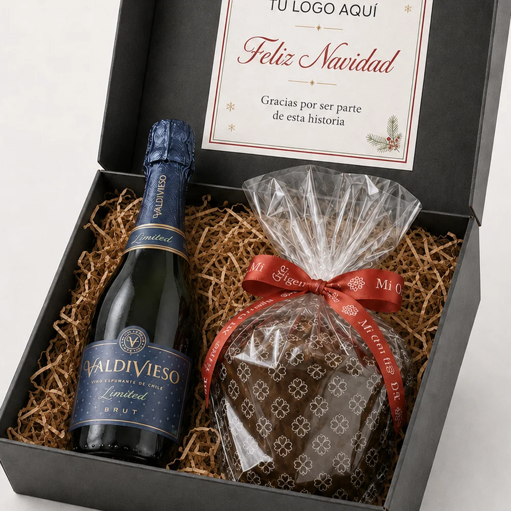 Caja Brindis Navideño con Espumante Valdivieso Brut de 187,5 ml y Mini Pan de Pascua en empaque corporativo.