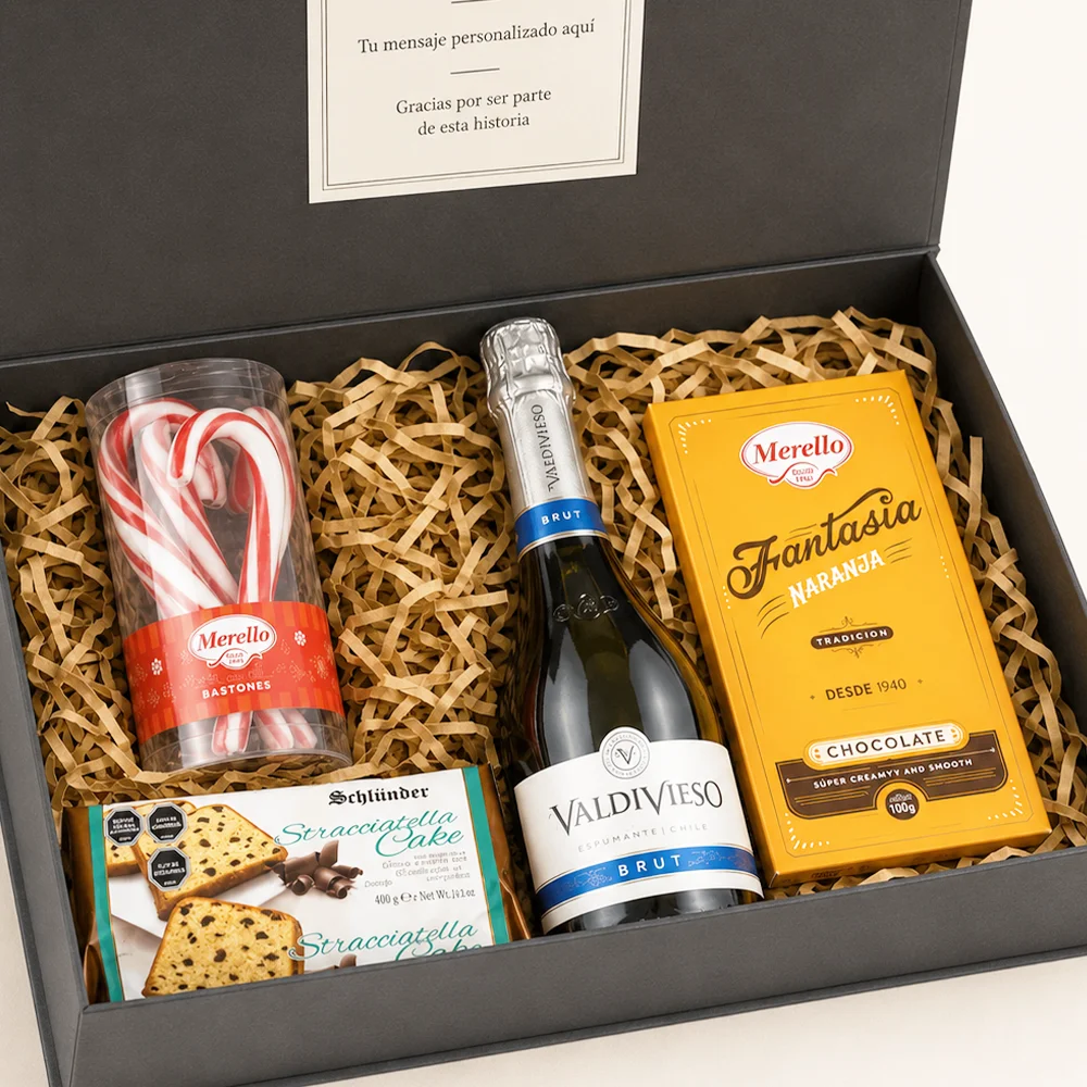 Caja de regalo corporativo roja Navidad Clásica con Cake Stracciatella Schlunder, Espumante Valdivieso y chocolates Merello.