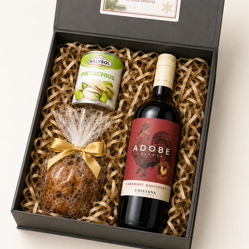 Caja de regalo corporativo roja Regalo de Invierno con Pan de Pascua Paradiso pequeño, vino Adobe y pistachos.