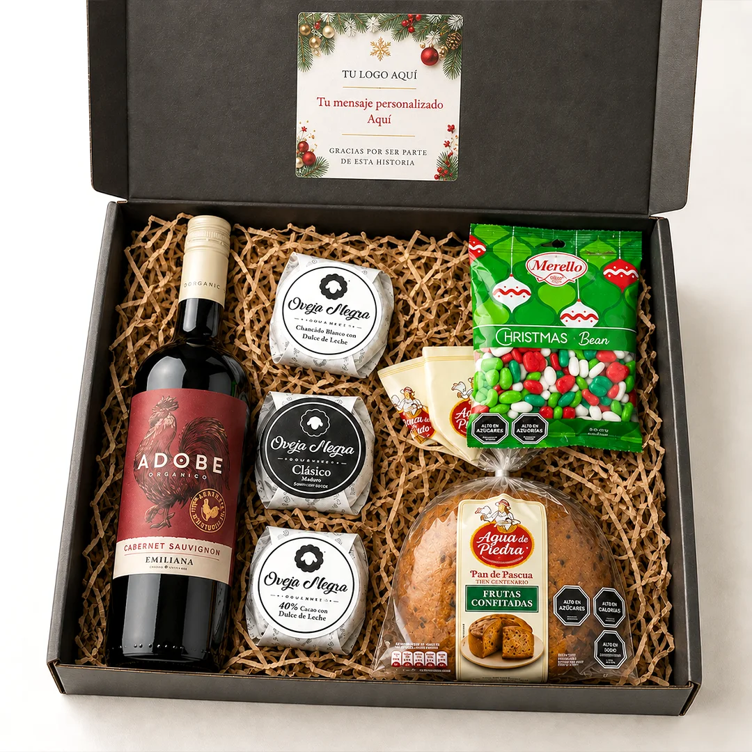Caja de regalo corporativo Sorpresa Navideña con vino Adobe, Pan de Pascua de 500g, trío de alfajores y porotitos de caramelo.