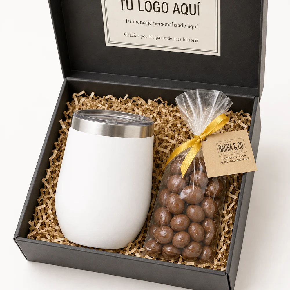 Caja Calidez y Tentación con Mug Térmico Mallow y almendras bañadas en chocolate.