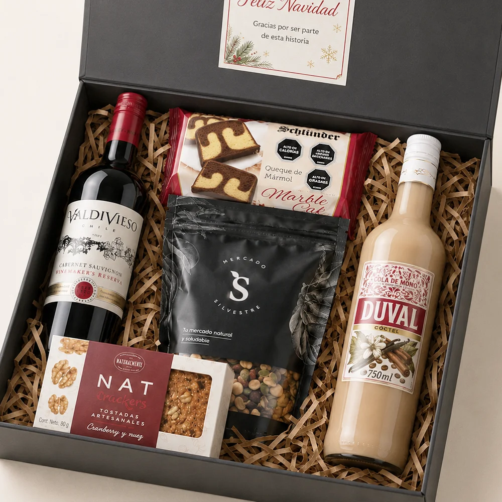 Caja Gran Brindis Navideño con vino Carménère Valdivieso, Cola de Mono, queque con chocolate, crackers y frutos secos.
