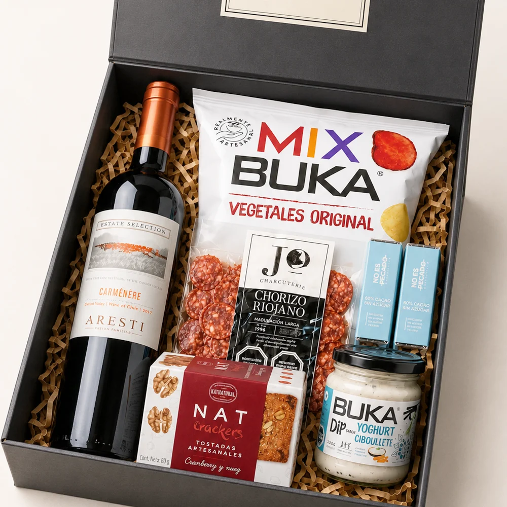Caja Vinícola y Tentaciones Gourmet con vino Carménère Aresti, chorizo riojano, dip de ciboulette, crackers NAT, mix de vegetales y chocolate amargo.