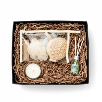 Caja de regalo corporativo Set Zen con vela aromática, esencia, esponja y accesorios de spa y madera.